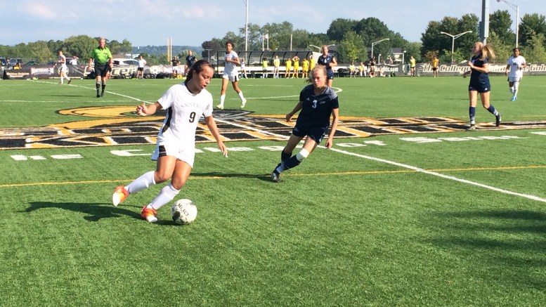 In the losing effort, sophomore Julia Porzio (26) scored the first goal of her collegiate career. Photo by Joshua Bogardus